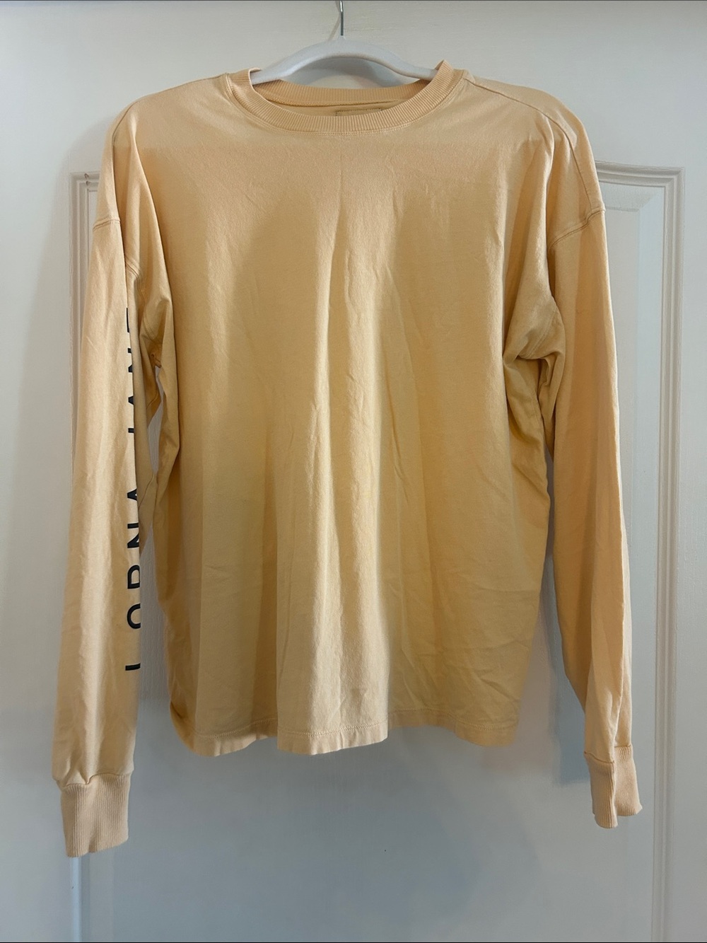 Lorna Jane Cream Long Sleeve Tee with Black Sleeve Script